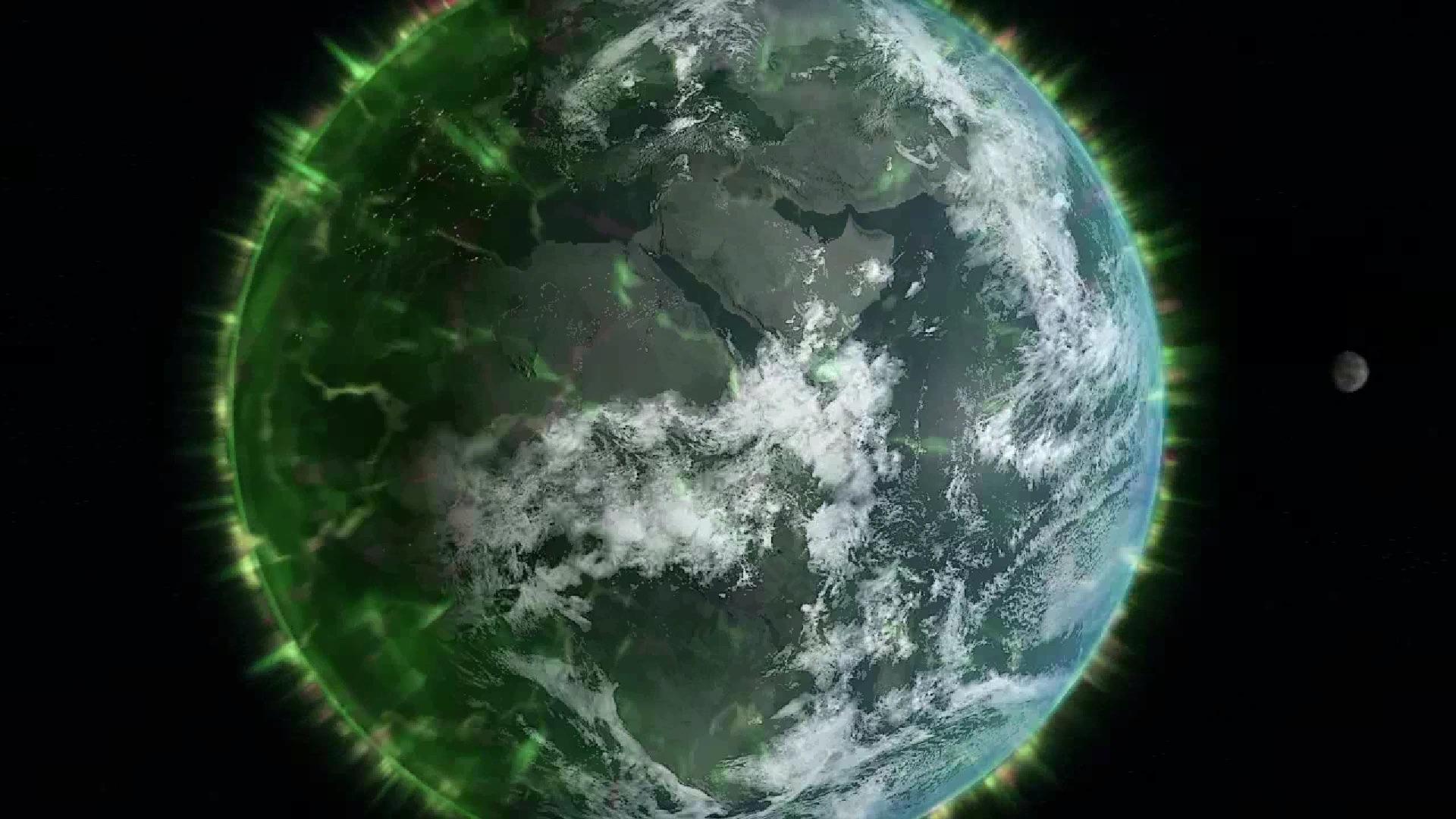 オーロラに包まれる地球